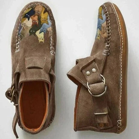 Women's printed slip-on shoes with an artistic cat motif, offering unique style and comfortable everyday wear.