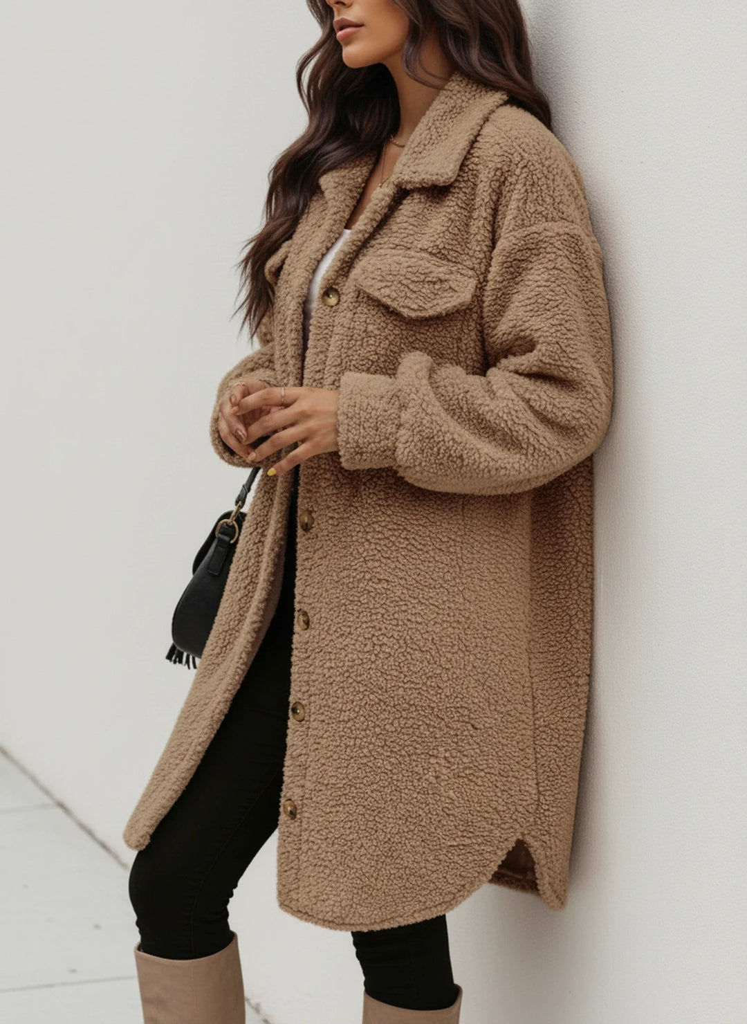 Soft women's oversized button-down shacket, perfect for casual layering. A cozy and stylish fall fashion jacket.