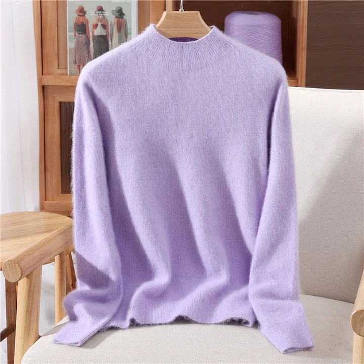 Cozy women's mockneck knit sweater top made from soft cashmere, great for fall layering.