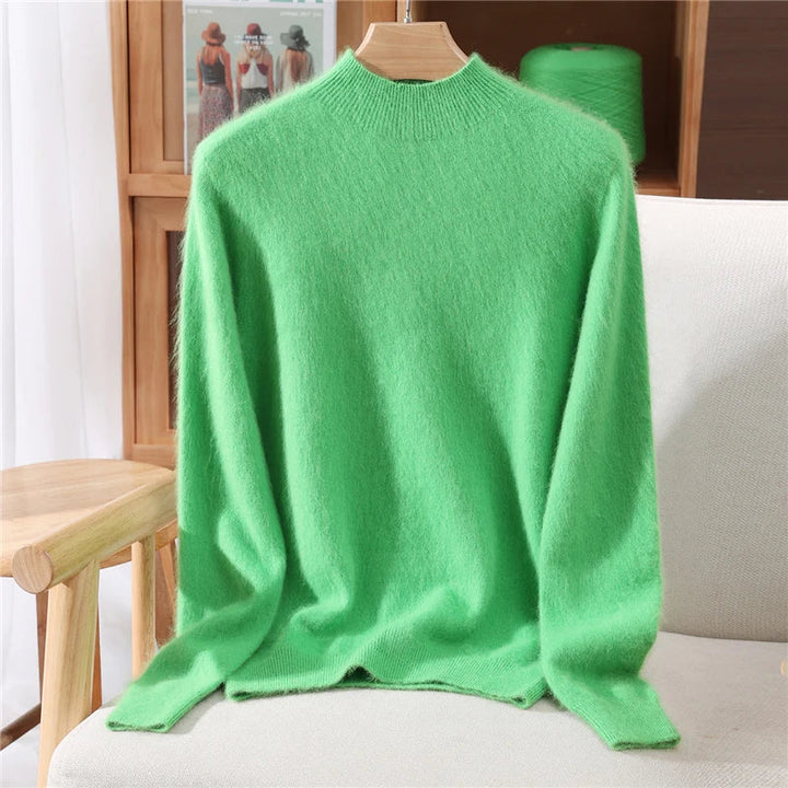 Warm & cozy women's cashmere knit mockneck sweater top, essential for fall and winter style.