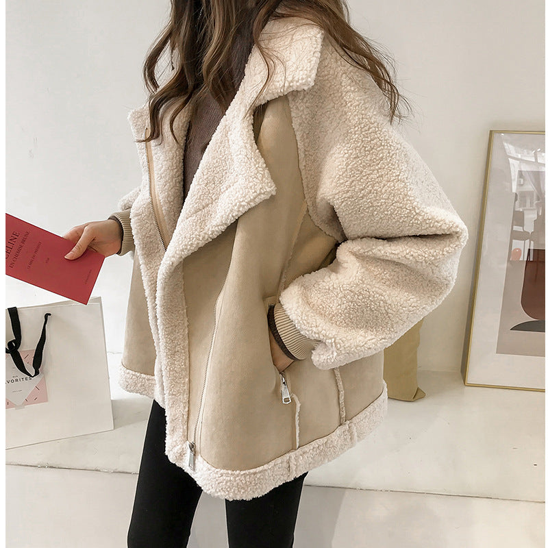 Women's soft faux shearling oversized coat, perfect for cozy winter fashion and stylish outerwear.