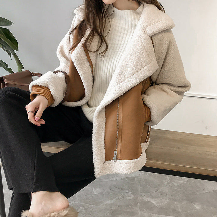 Stylish women's faux shearling oversized coat, a cozy winter fashion essential and warm casual jacket.