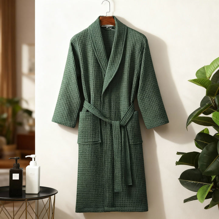 Close-up of the delicate waffle texture on a lightweight women's robe, emphasizing softness.