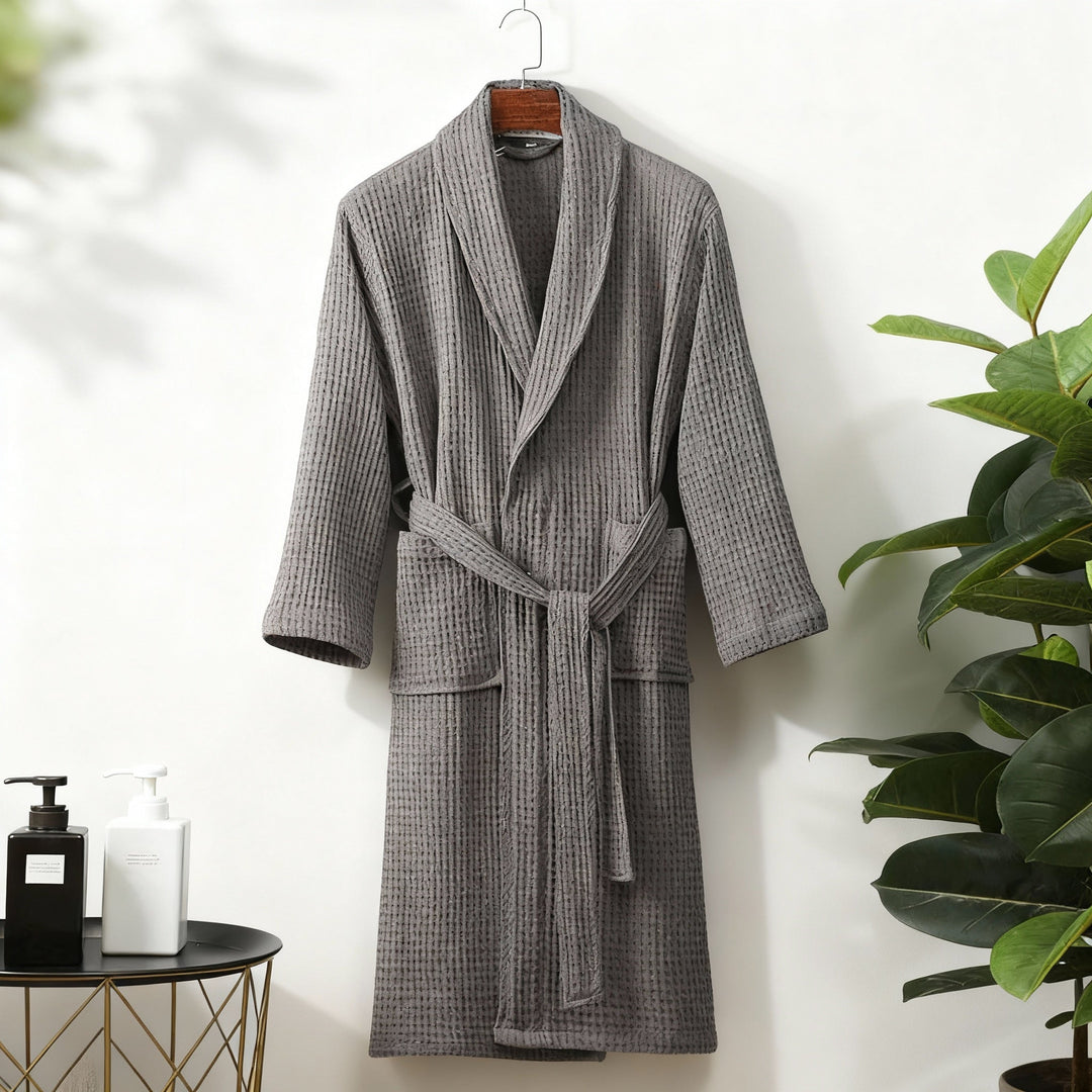 Elegant women's spring robe made from waffle fabric, featuring a chic tie waist for adjustable comfort.
