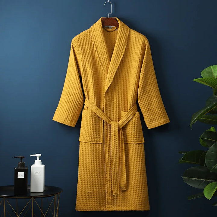 Relaxed fit waffle lounge robe for women, offering soft, breathable comfort for spring evenings.