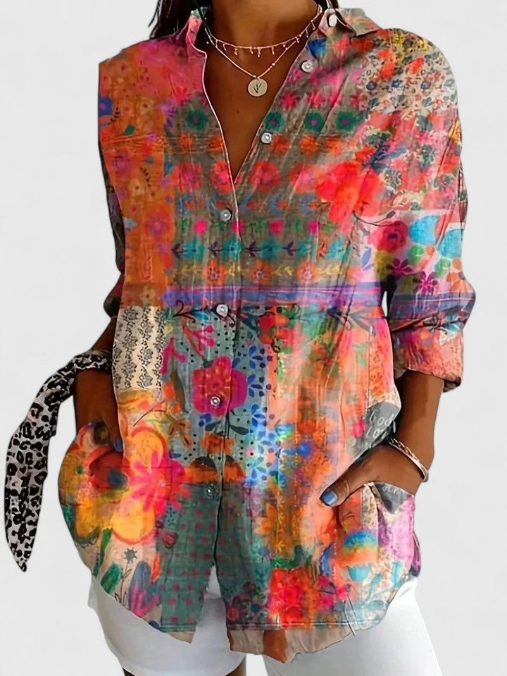 Close-up of a women's elegant blouse, showcasing its unique and sophisticated print. Ideal for versatile casual or dressy wear.