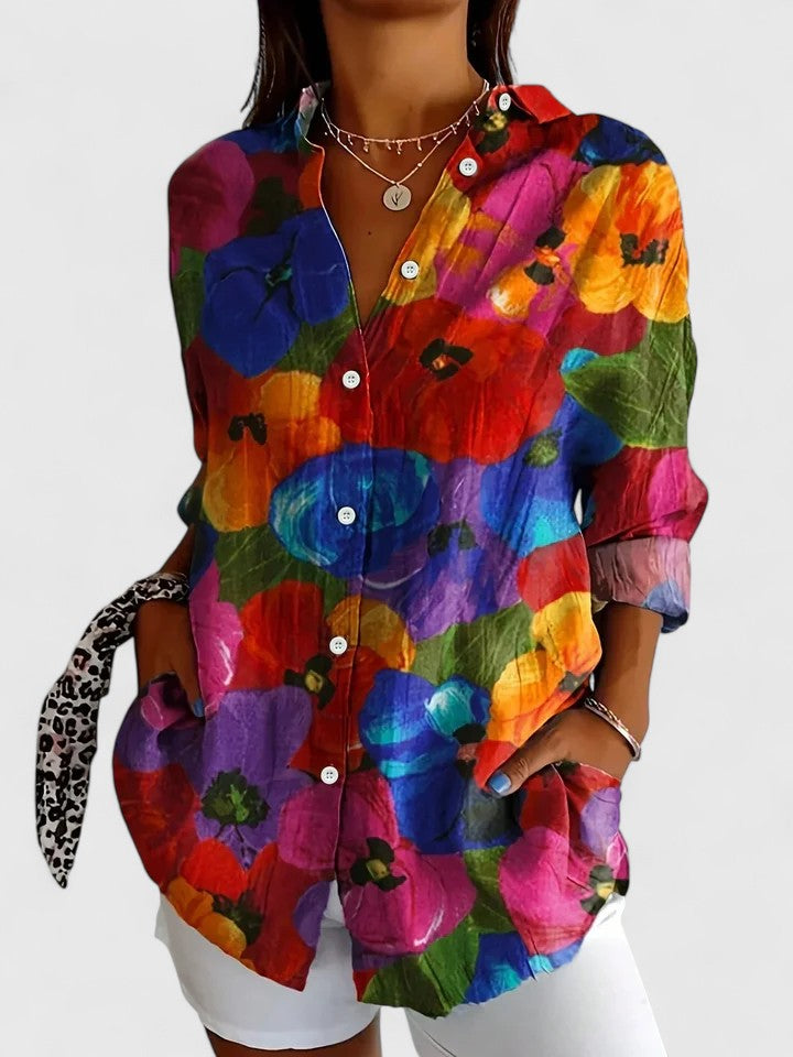 Elegant women's print blouse with unique design, perfect for sophisticated office or evening wear. A versatile spring/summer top.