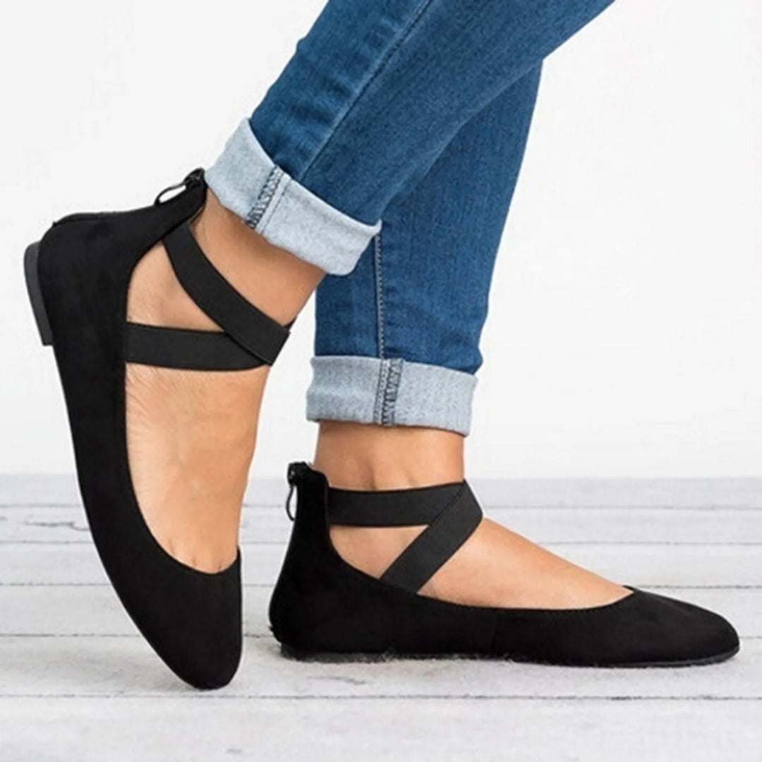 Top-down view of women's comfortable cross-strap ballet flats, highlighting the design and sole