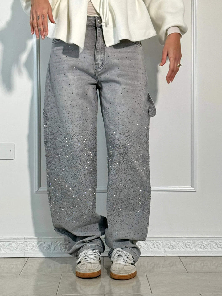 Styled image of women's wide leg flowy pants, paired with a simple top for a casual spring look.