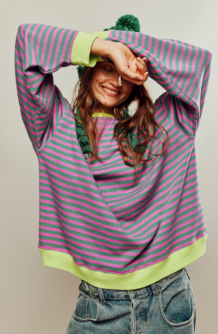 Women's striped crewneck sweater in relaxed fit, perfect for spring casual wear.
