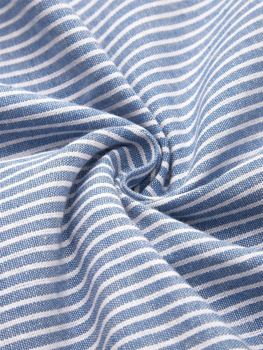 Stylish women's midi dress featuring classic stripes, functional button detail, and practical side pockets.