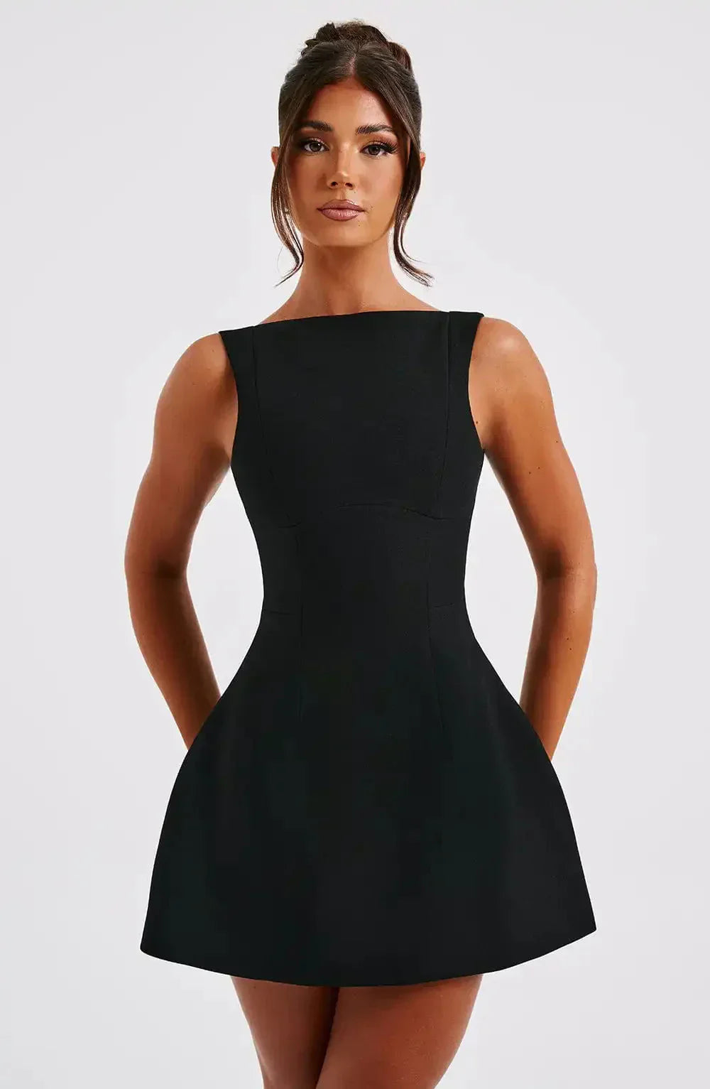 Women's structured boat neck fit & flare mini dress for parties. Elegant sleeveless cocktail dress.