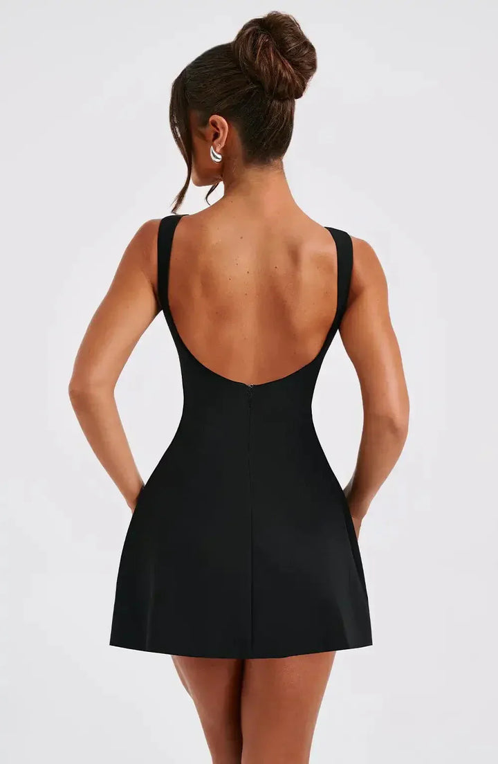 Versatile women's boat neck mini dress with a modern structured fit & flare silhouette, perfect for date night.