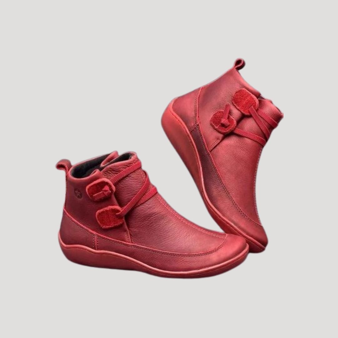 Comfortable women's ankle boots with decorative straps, ideal for everyday spring fashion and versatile wear.