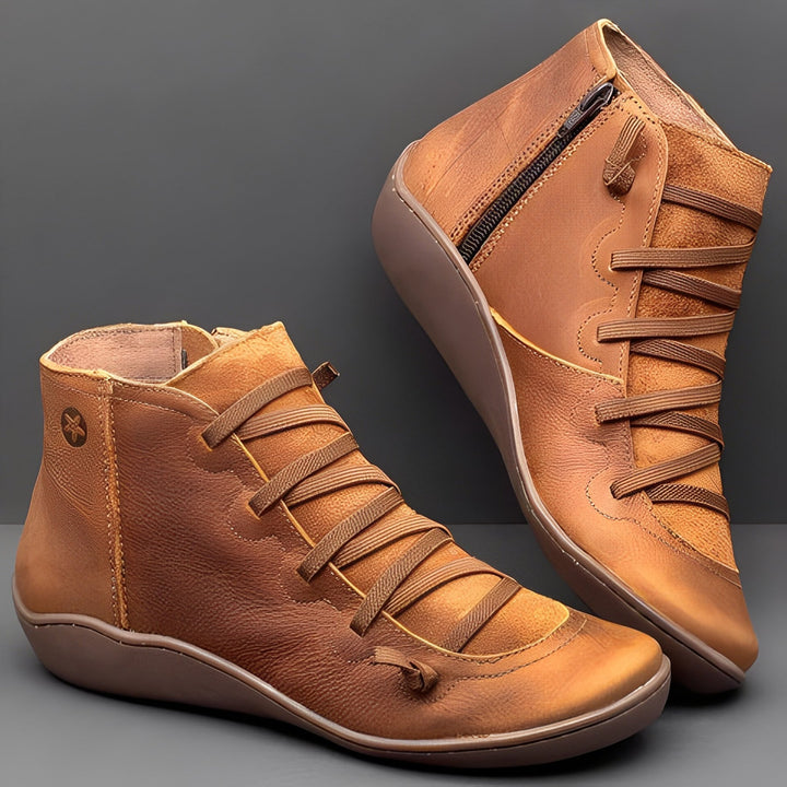 Trendy women's ankle boots with secure lace-up and zip closure, offering comfort and fashion.
