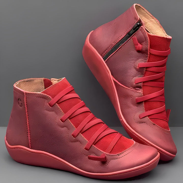 Close-up of a women's fashionable lace-up zip ankle boot, highlighting its quality and stylish design.