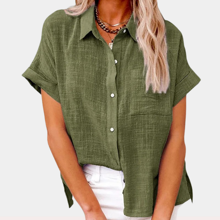 Chic women's short sleeve button-down blouse, ideal summer top. Collared for a refined yet casual look.