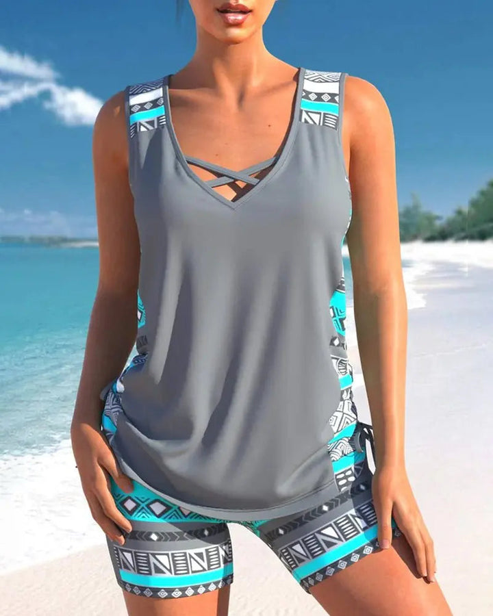 Women's stylish tankini swimsuit, perfect for summer comfort and beachwear. Features a flattering fit & elegant design.