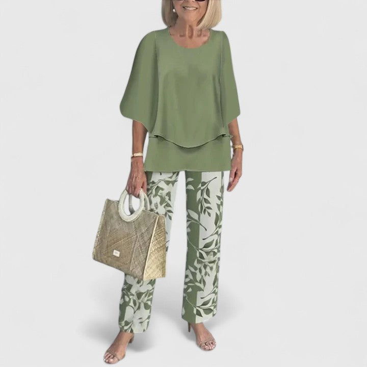 Women's stylish two-piece casual outfit with a crew neck half-sleeve top and fashionable printed pants.