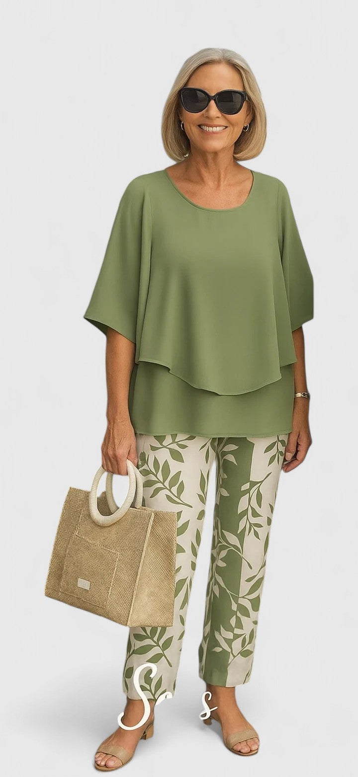 Relaxed women's two-piece set featuring a crew-neck top and comfortable printed trousers, perfect for daily fashion.