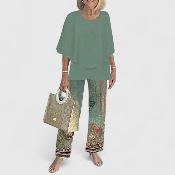 Versatile women's fashion outfit: a half-sleeve top and eye-catching printed pants, perfect for everyday style.