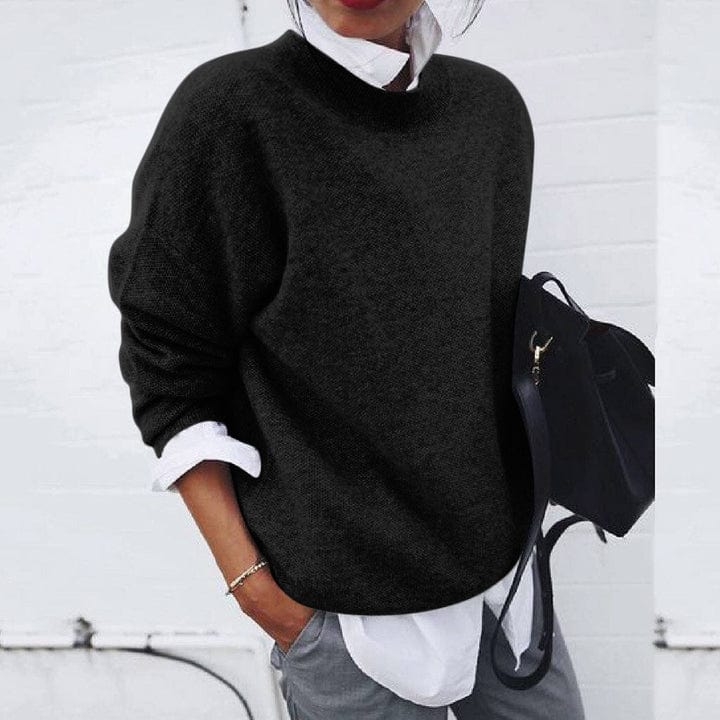 Comfortable women's long sleeve knit pullover with a classic round neck, great for everyday casual wear.