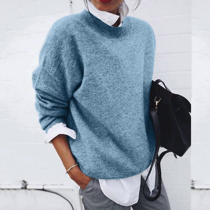 Stylish women's pullover featuring a super soft knit fabric and round neck, a cozy winter fashion essential.