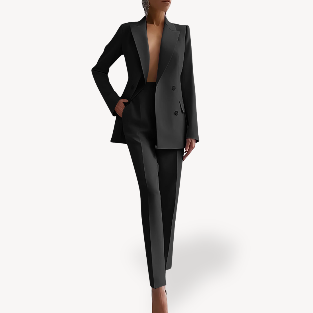 Women's tailored blazer and trousers suit set in a sleek design, perfect for professional business wear.