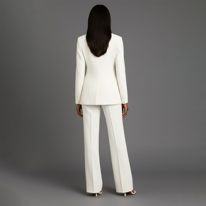 Sophisticated women's blazer and pants set for professional office attire.
