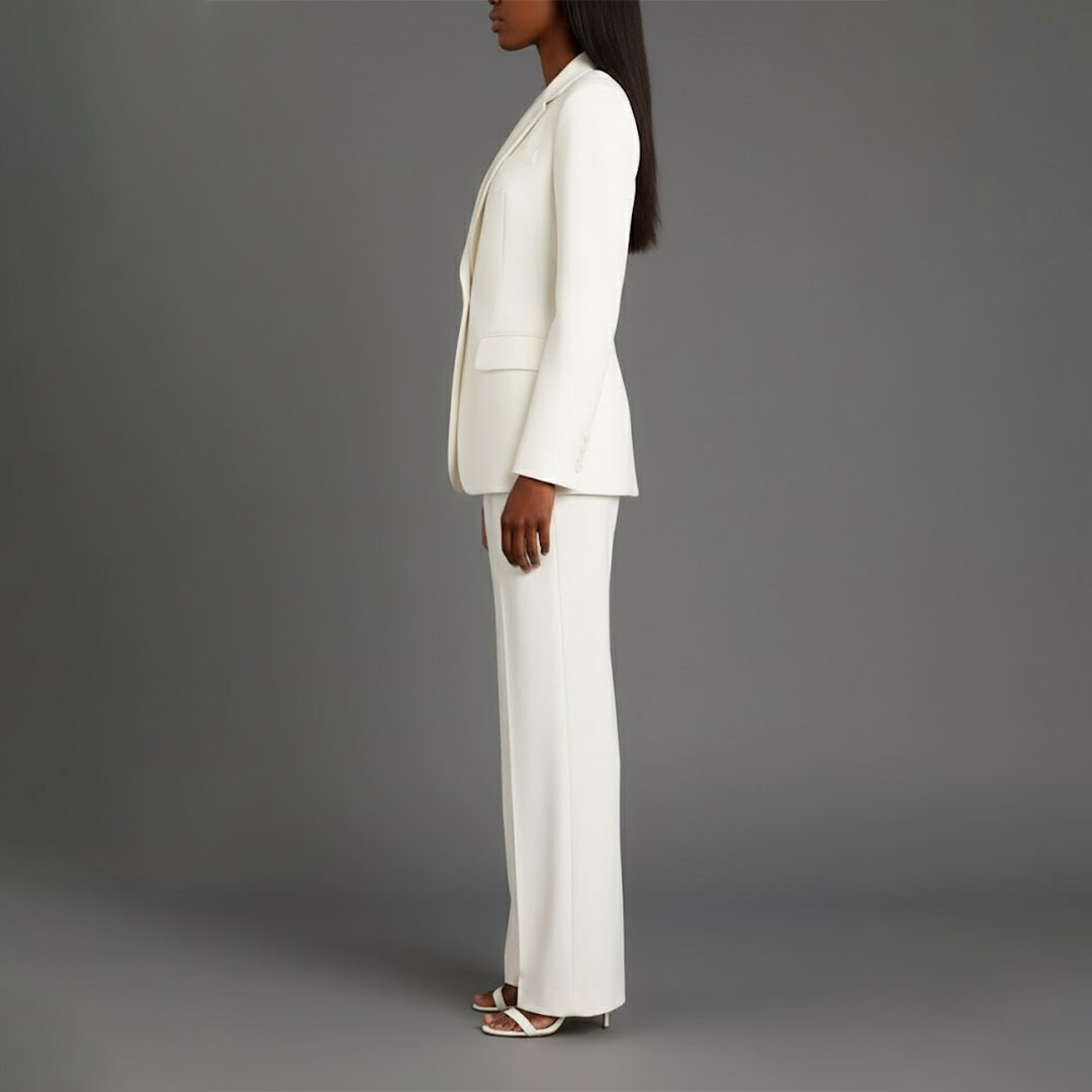 Elegant women's tailored suit, featuring a long blazer & matching straight-leg pants.