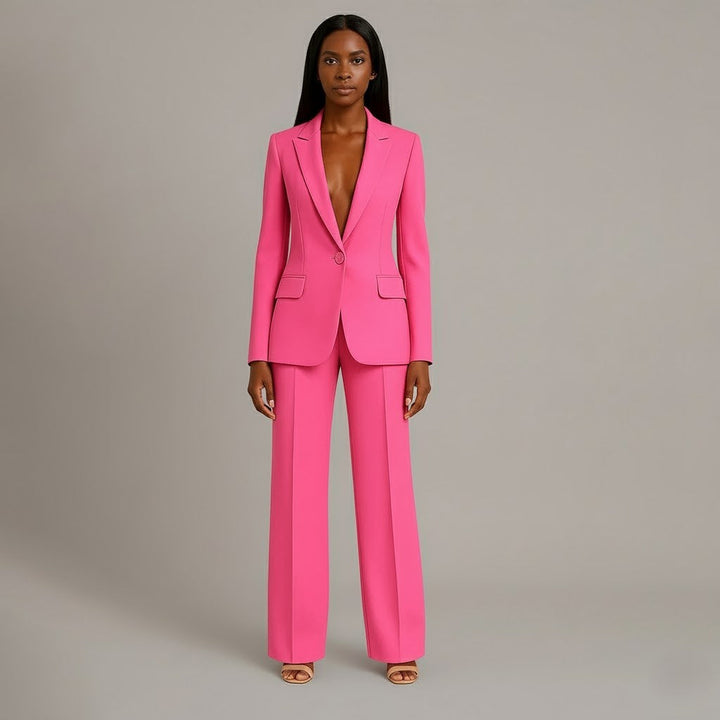 Stylish long blazer and matching tailored pants, making a complete women's suit.