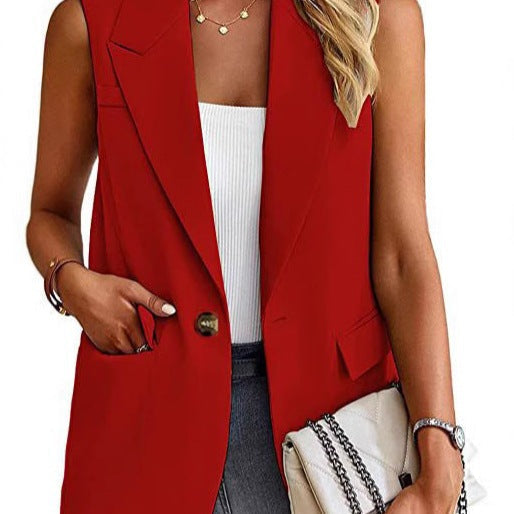 Women's tailored sleeveless blazer vest, a chic and professional layering piece for office wear.