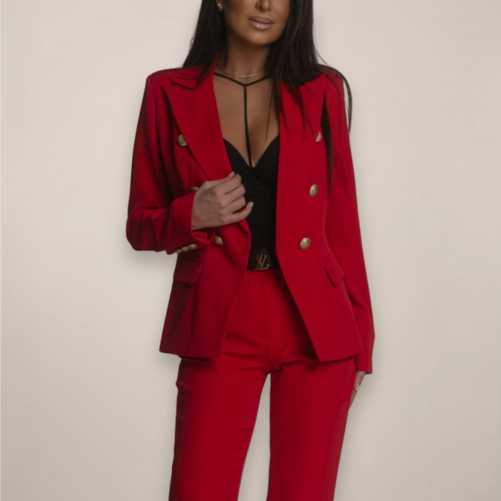 Fashionable woman walking confidently in a tailored white spring blazer and trousers suit set