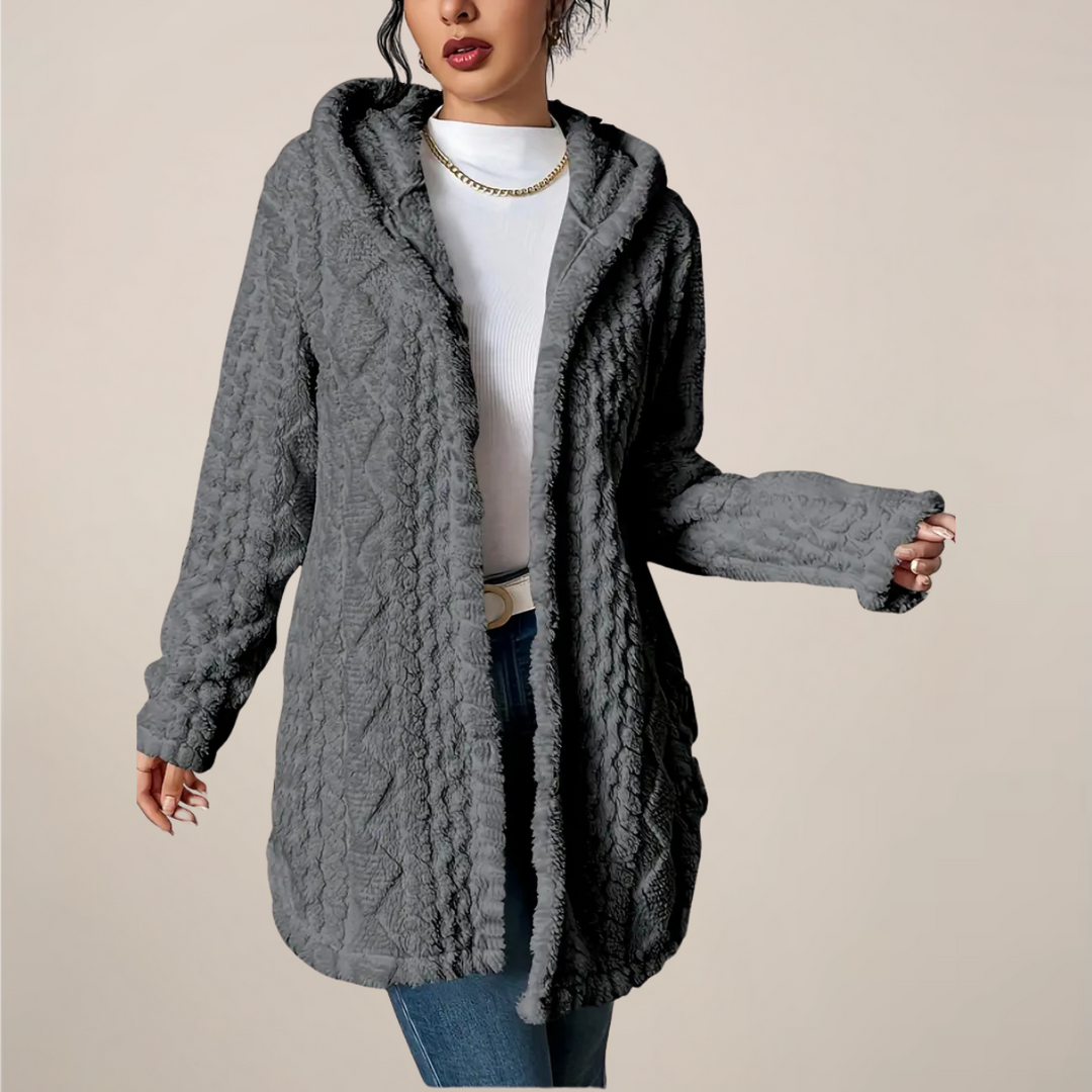 Women's textured knit long hooded cardigan in a neutral color, perfect for spring layering