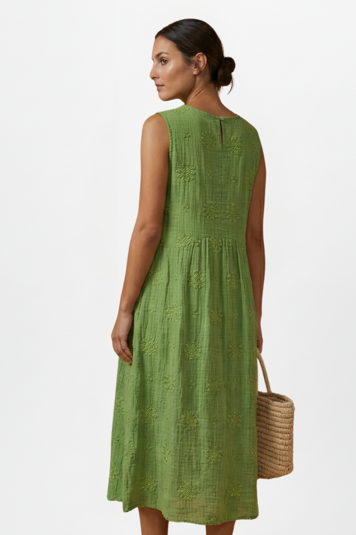 Unique patterned textured women's midi dress, sleeveless, with deep pockets for daily casual wear.