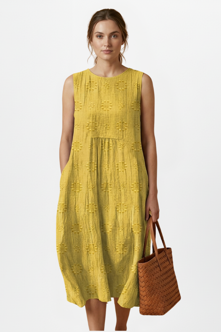 Modern relaxed fit textured sleeveless midi dress for women, with comfortable round neck and pockets.