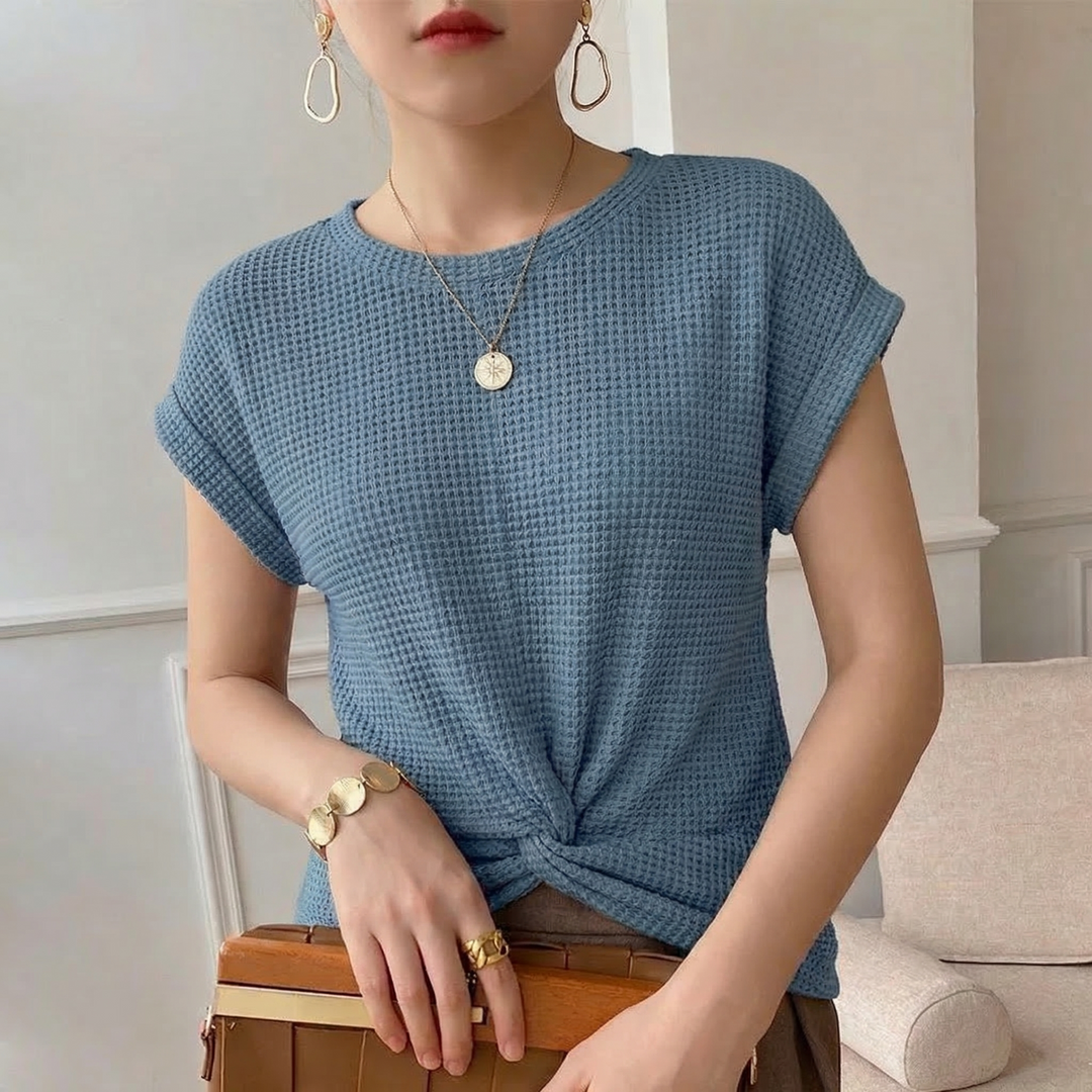 Elegant women's blouse with a textured twist front and long sleeves, for a modern, versatile look.