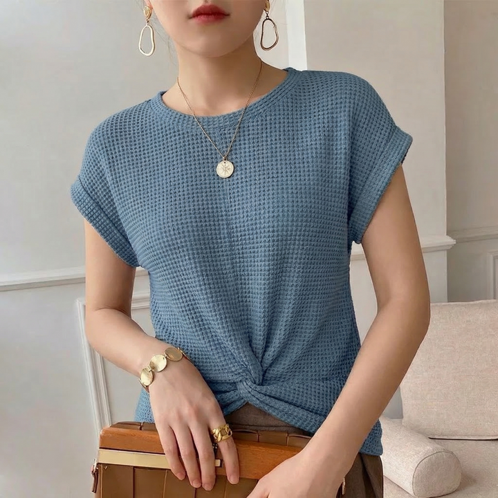 Elegant women's blouse with a textured twist front and long sleeves, for a modern, versatile look.