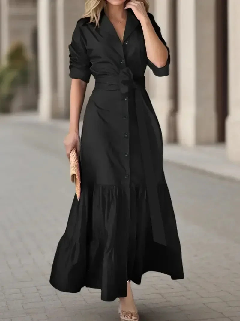 Women's tiered maxi shirt dress with tie waist. Elegant long sleeve button-down for versatile style.