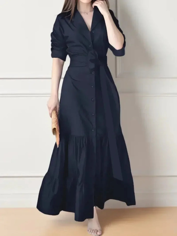 Flowy women's tiered maxi dress with tie waist. A casual long sleeve shirt dress, perfect for sophisticated comfort.