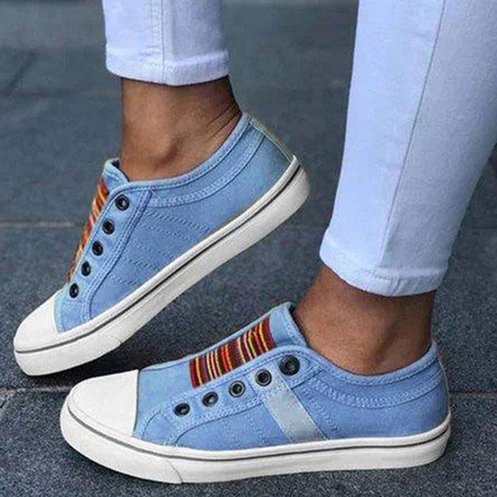 Fashionable women's slip-on sneakers, low-top design with a comfortable and stylish appeal.