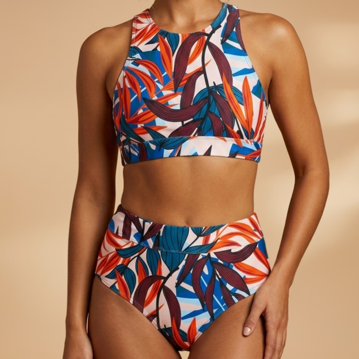 Plus size tropical print high neck bikini top & high waisted bottoms. Stylish, full coverage women's swimwear.