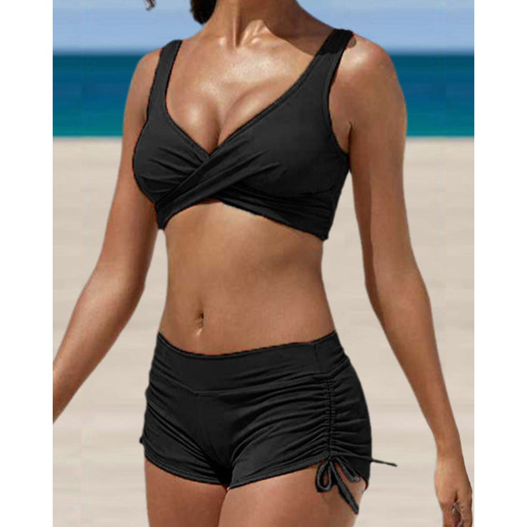 Women's two-piece bikini with adjustable straps. Flattering high-waist swimwear for stylish summer fashion.