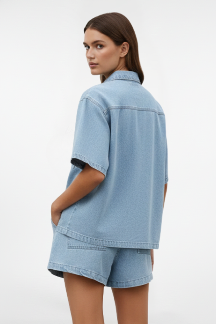 Chic women's two-piece set featuring a short-sleeve top & high-waist shorts. Effortless spring/summer casual fashion.