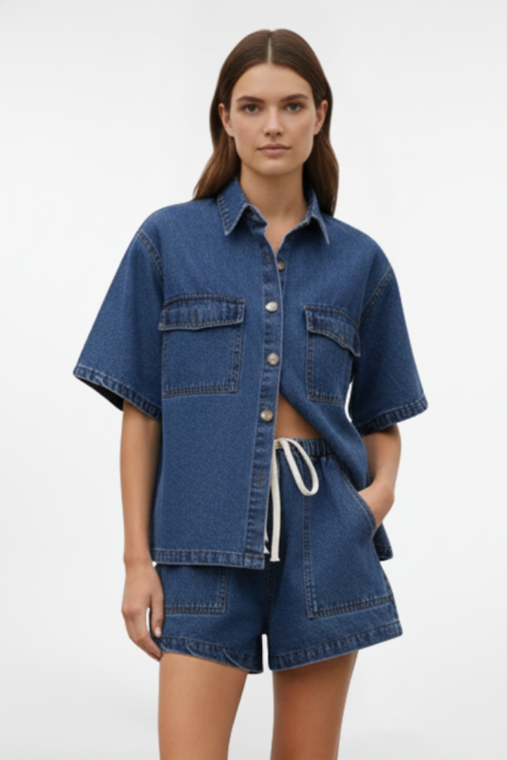 Modern women's two-piece short-sleeve shirt jacket & high-waist shorts set for a complete spring/summer look.