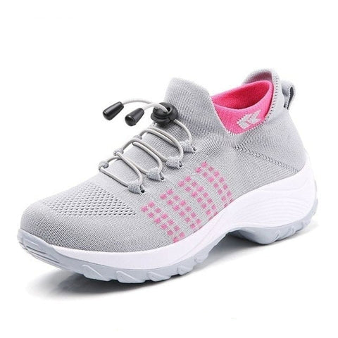 Women's comfortable slip-on sneakers, designed with stretch material and a supportive cushion sole.
