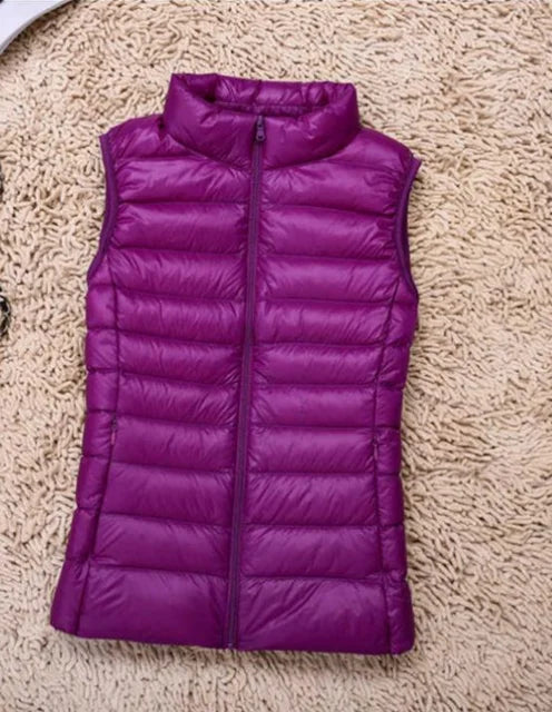 Casual women's warm puffer vest, ultra-light for everyday wear & outdoor activities. A comfortable travel vest.