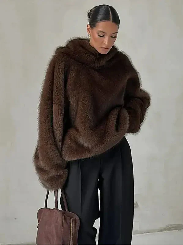 Women's ultra-soft oversized hoodie in a cozy relaxed fit for luxurious warmth and casual style.
