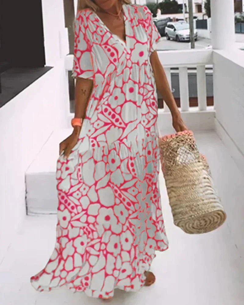 Casual yet elegant women's V-neck abstract print flowy maxi dress, ideal for beach days.