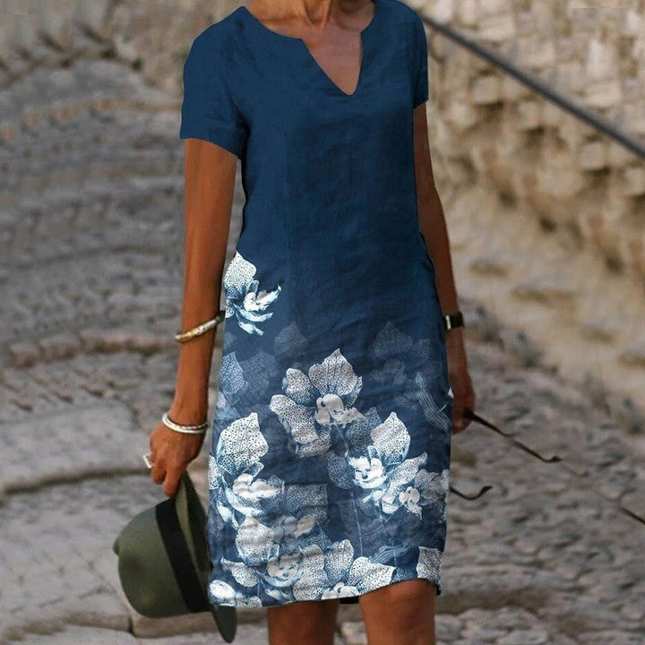 Women's v-neck floral print summer midi dress, perfect for casual wear & beach outings